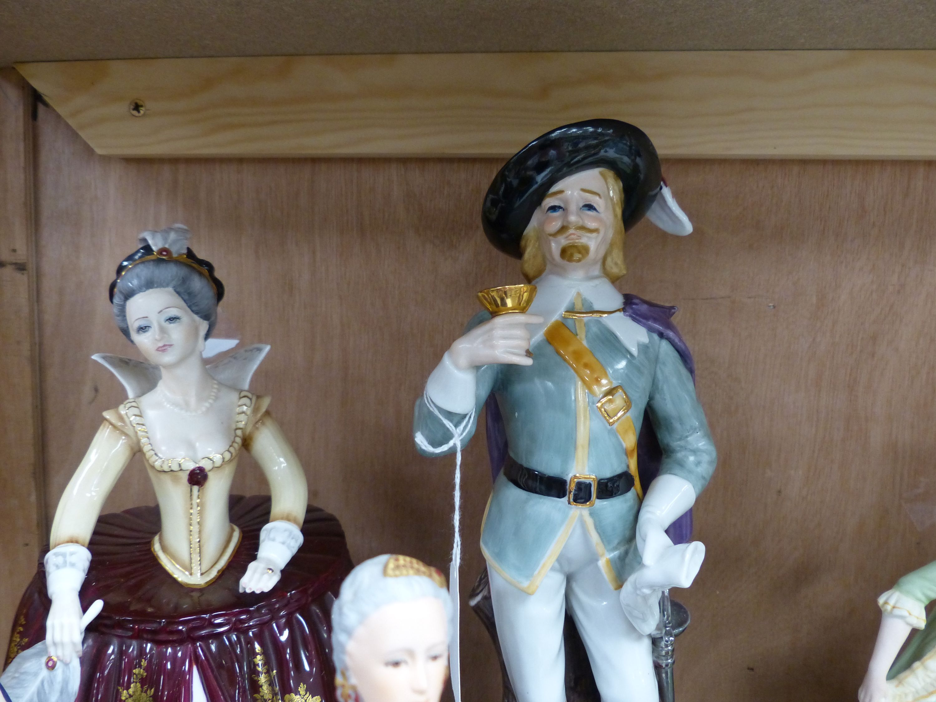 Ten various ceramic figurines by Coalport, Royal Worcester, Franklin Mint and others